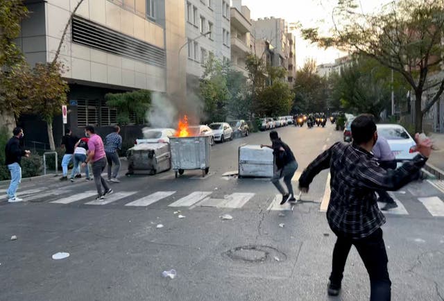 <p>Protesters set fires in Tehran, Iran’s capital</p>
