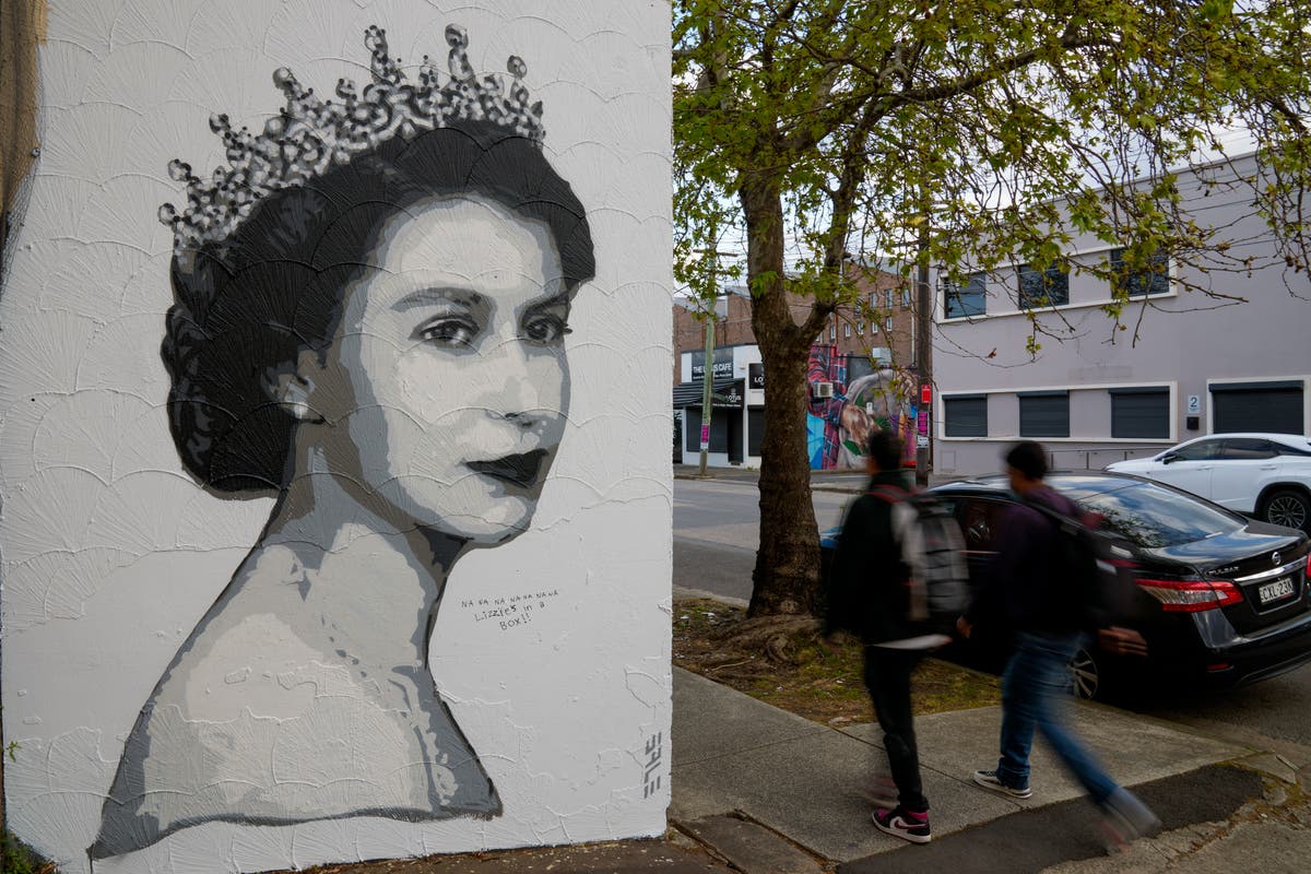 Union Jack set on fire while Australia marks national day of mourning for Queen