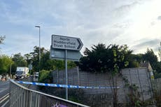 Boy, 16, arrested on suspicion of murder after teen stabbed outside school gates