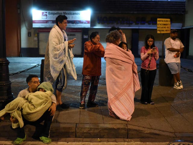 <p>Residents on the street of Mexico following a 6.8 magnitude earthquake</p>