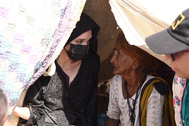 <p>Actor and activist Angelina Jolie talking with women affected by floods in Dadu, Sindh province, Pakistan</p>