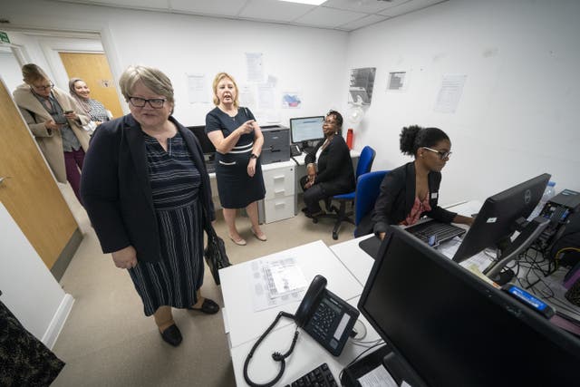Health and Social Care Secretary Therese Coffey (left) during her visit to The Marven Surgery in London (Kirsty O’Connor/PA)