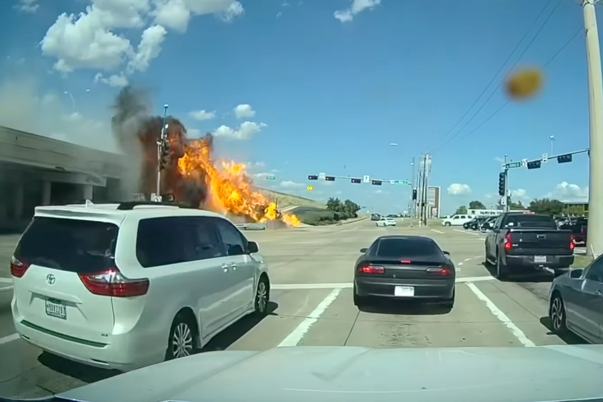 Truck driver killed after vehicle veers off overpass and bursts into ...
