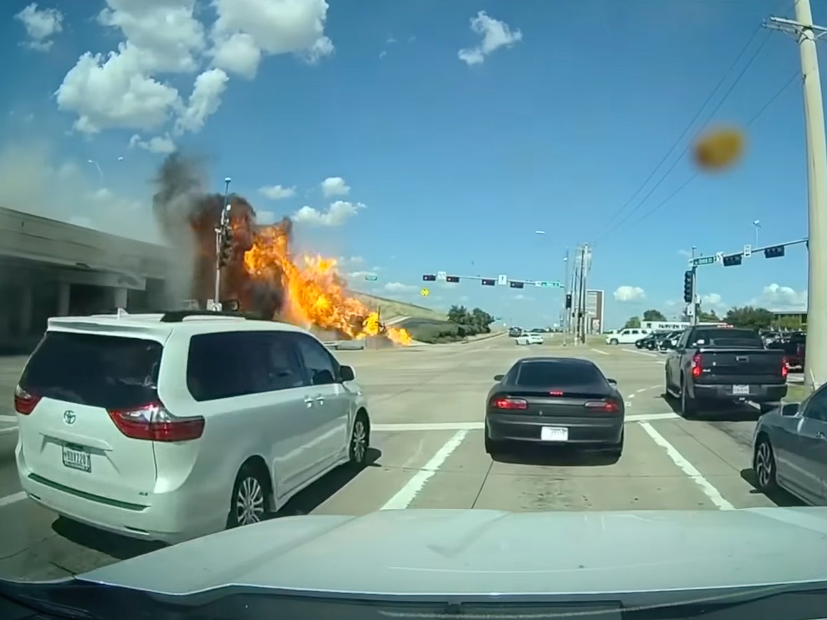 Truck driver killed after vehicle veers off overpass and bursts into flames