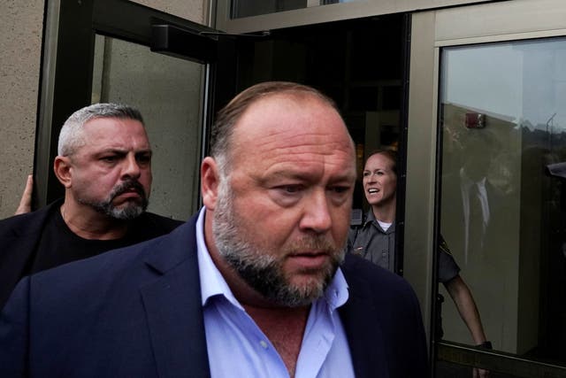 <p>Alex Jones arrives at the court house as he faces a second defamation trial over Sandy Hook </p>