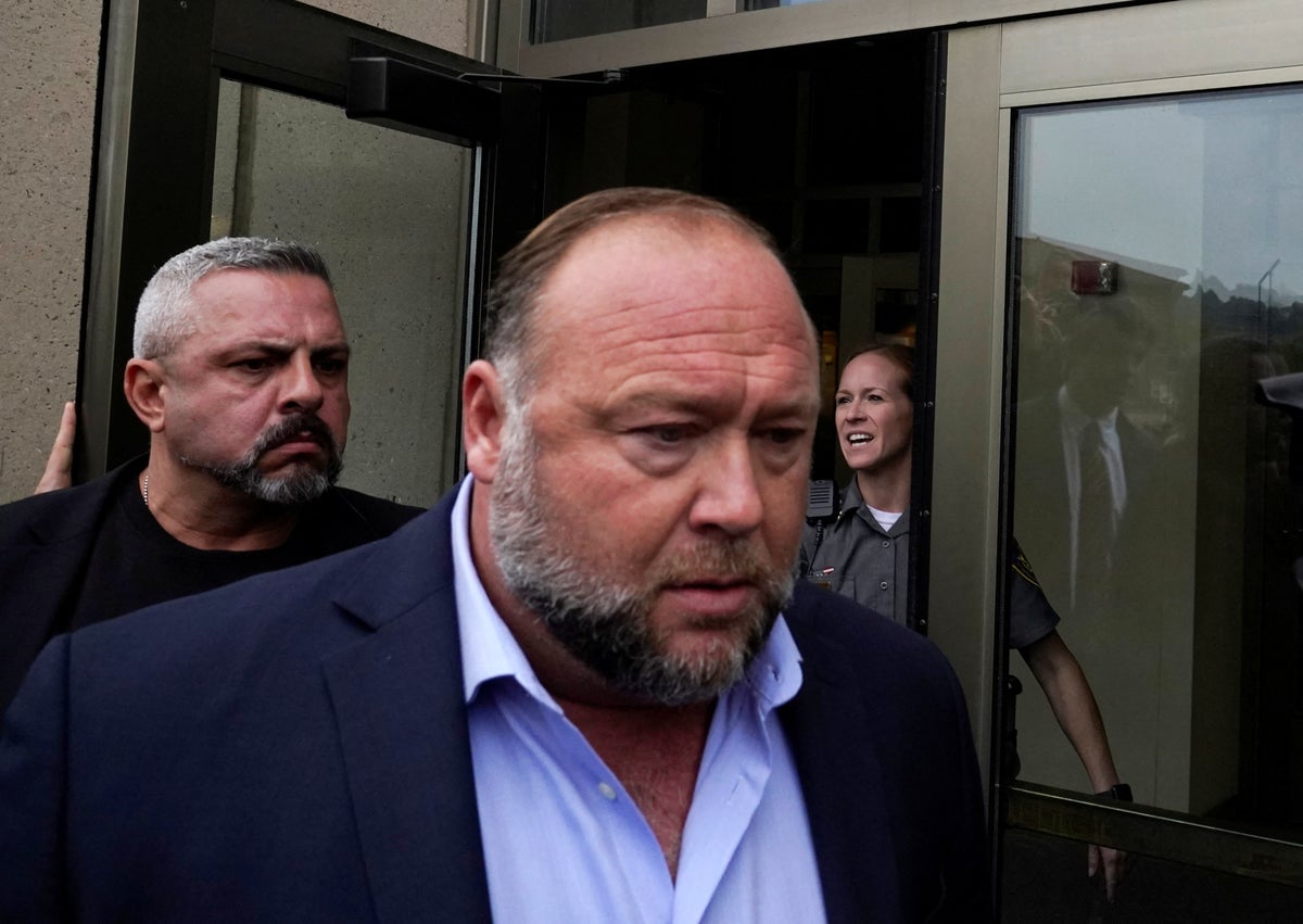 Alex Jones trial – live: Sandy Hook case enters fourth week with Infowars host expected to return to stand