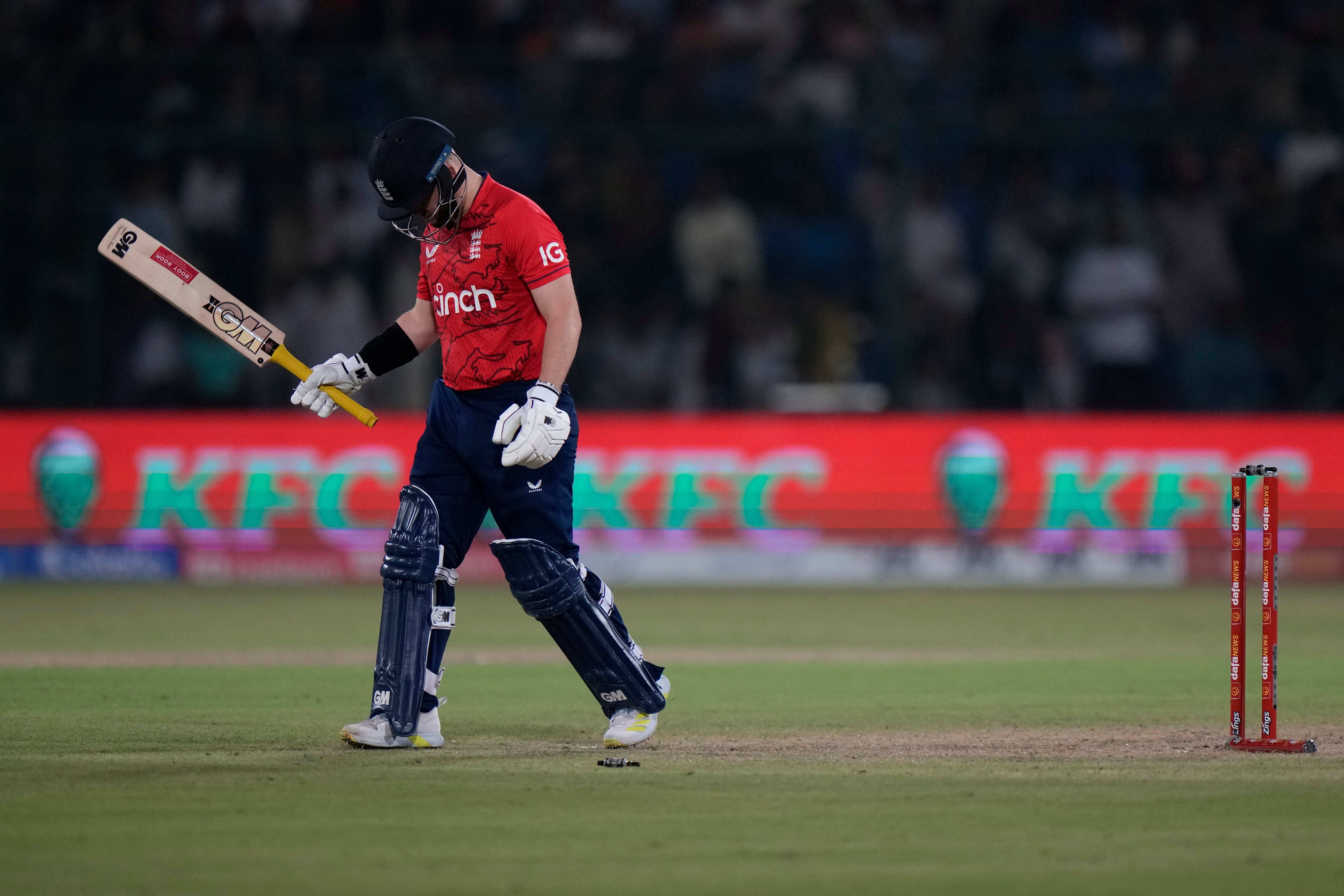 England’s Ben Duckett walks off the field after losing his wicket (Anjum Naveed/AP)