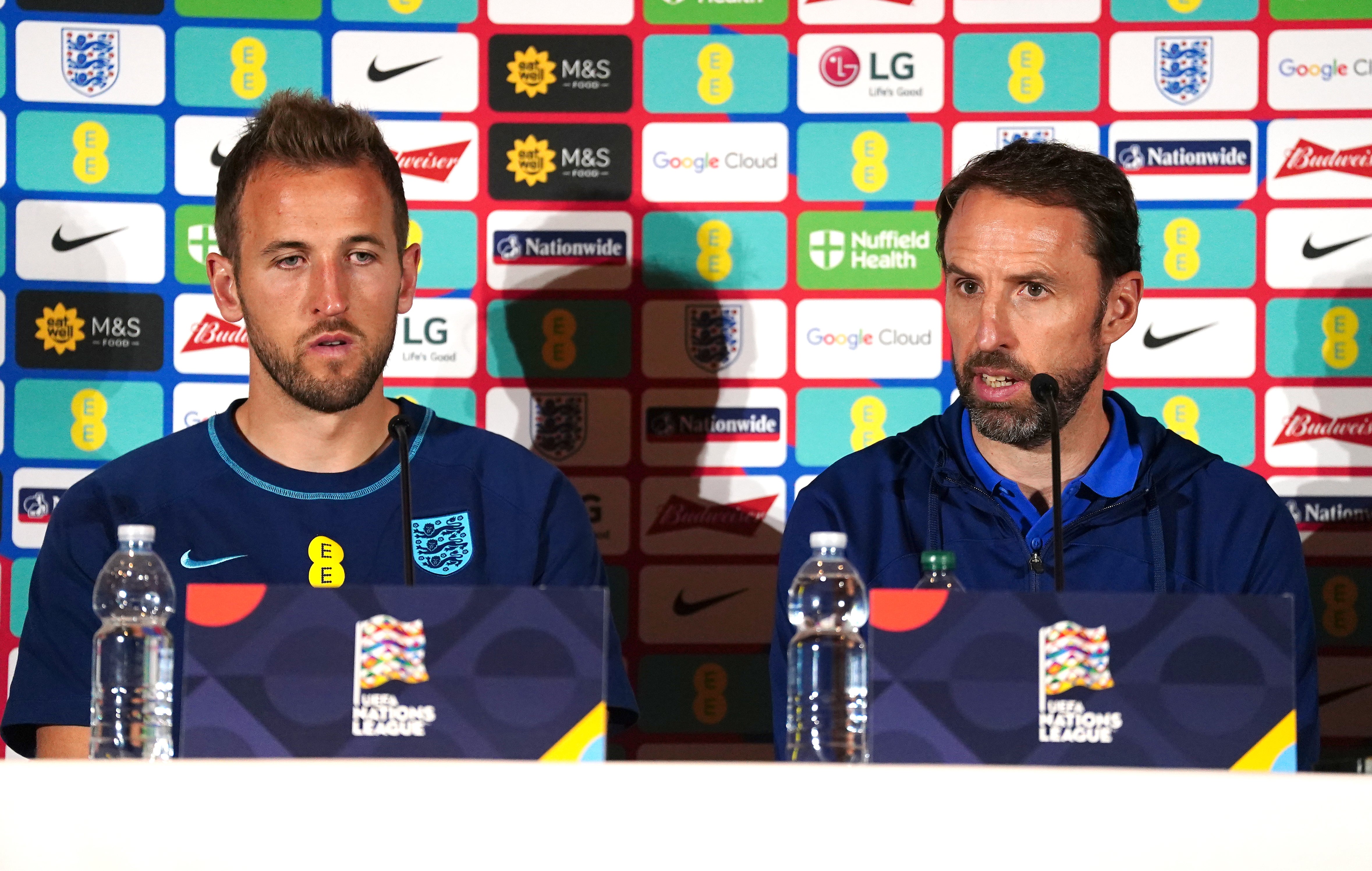 England manager Gareth Southgate, right, and captain Harry Kane spoke about how to address the ongoing issues in Qatar (PA)