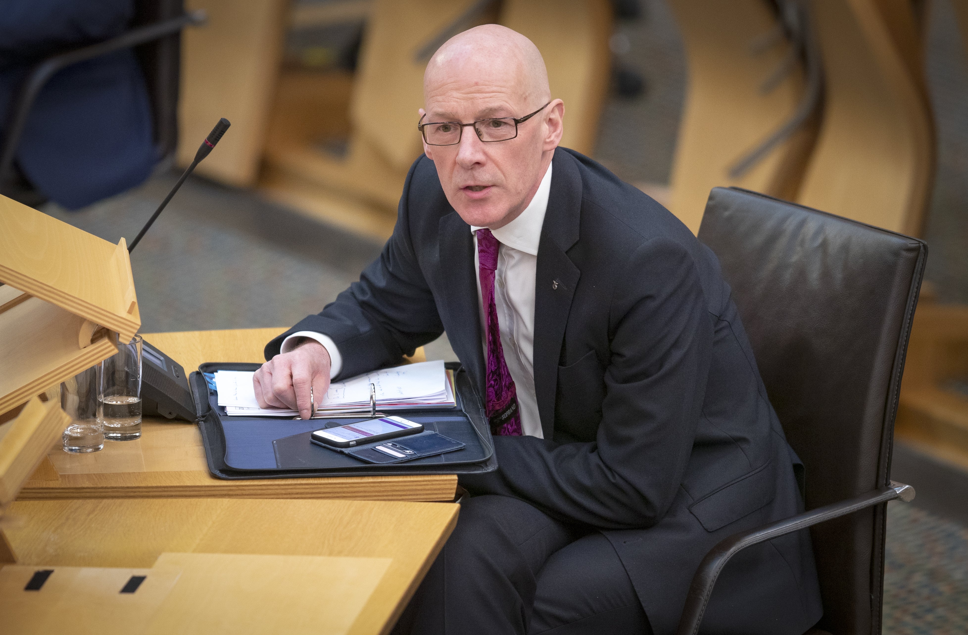 Deputy First Minister John Swinney argued UK Government policies ‘create poverty’ (Jane Barlow/PA)