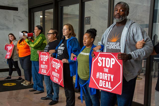 <p>Climate leaders at a protest on Thursday against an energy permitting reform bill introduced by Senator Joe Manchin</p>