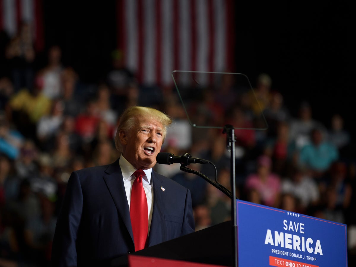 Trump news – live: Trump rallies in North Carolina after embracing QAnon on Truth Social