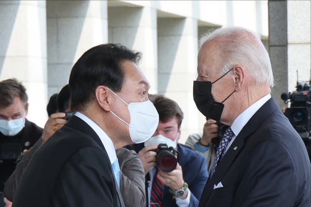 <p>South Korean president Yoon Suk-yeol greets US president Joe Biden in Seoul</p>