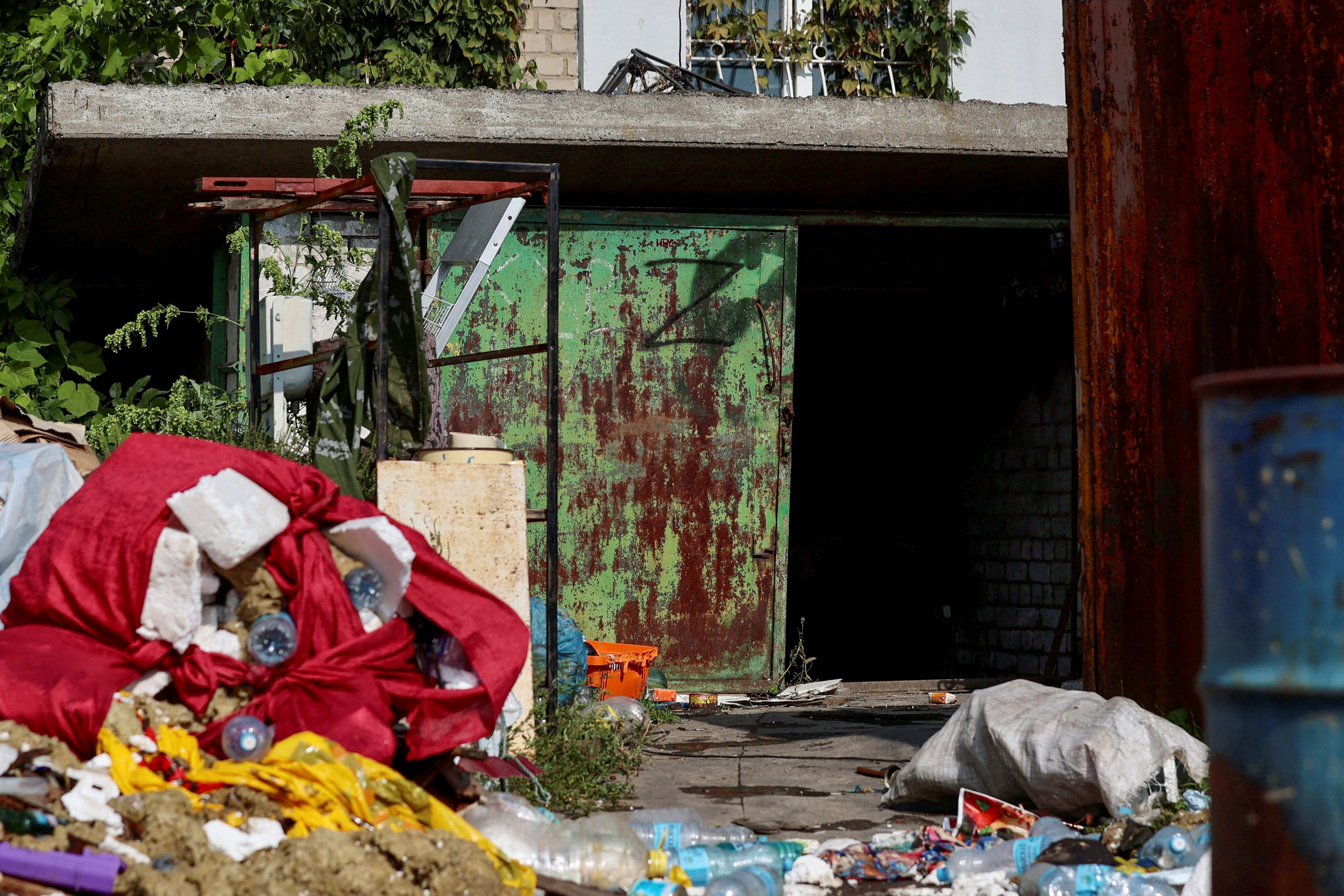 <p>Ukrainian authorities say the pictured building was a makeshift Russian prison and torture chamber </p>