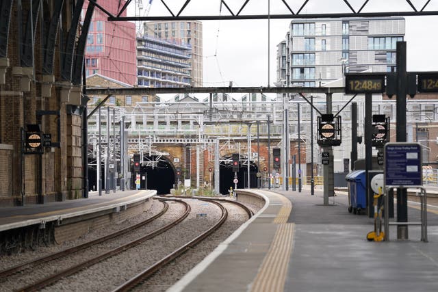 Empty platforms at King’s Cross railway station in London during a strike last month. More industrial action has been announced (Kirsty O’Connor/PA)