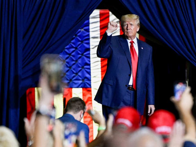 <p>Former US president Donald Trump has appeared to embrace QAnon on Truth Social</p>