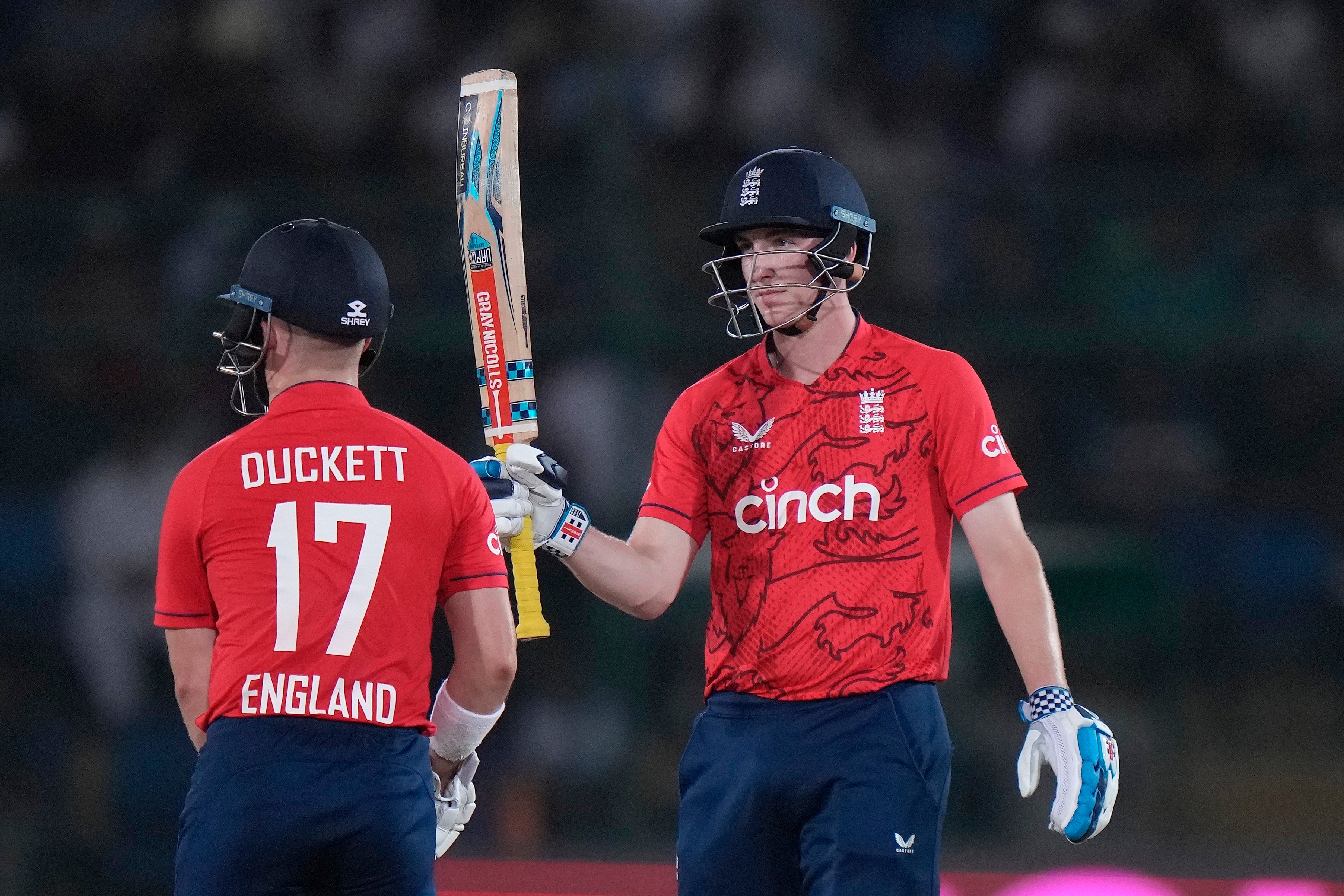 Harry Brook, right, celebrates his half-century (Anjum Naveed/PA)