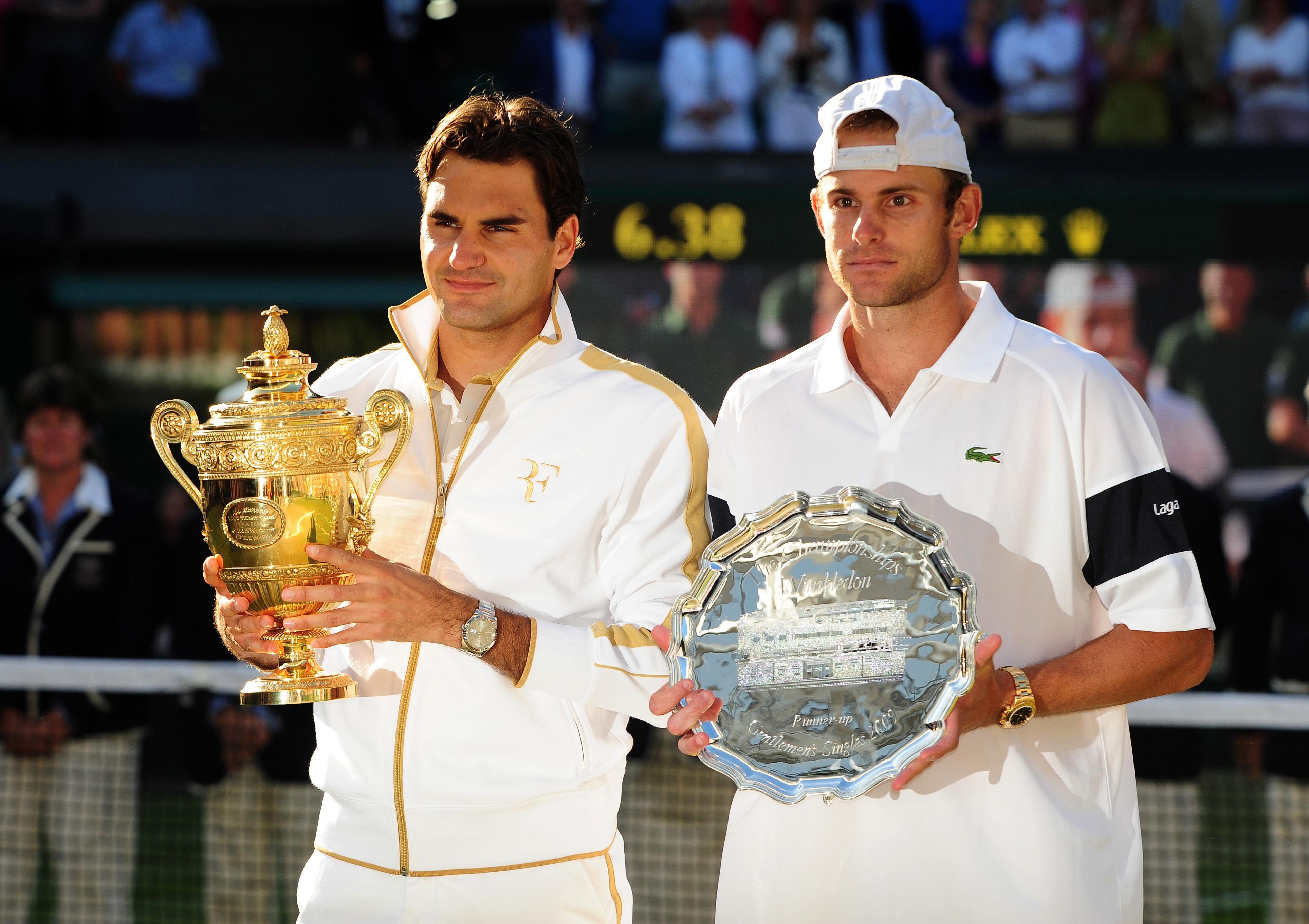 Roger Federer beat Andy Roddick over five sets in the 2009 Wimbledon final to surpass Pete Sampras’ record of 14 majors (Owen Humphreys/PA Archive)