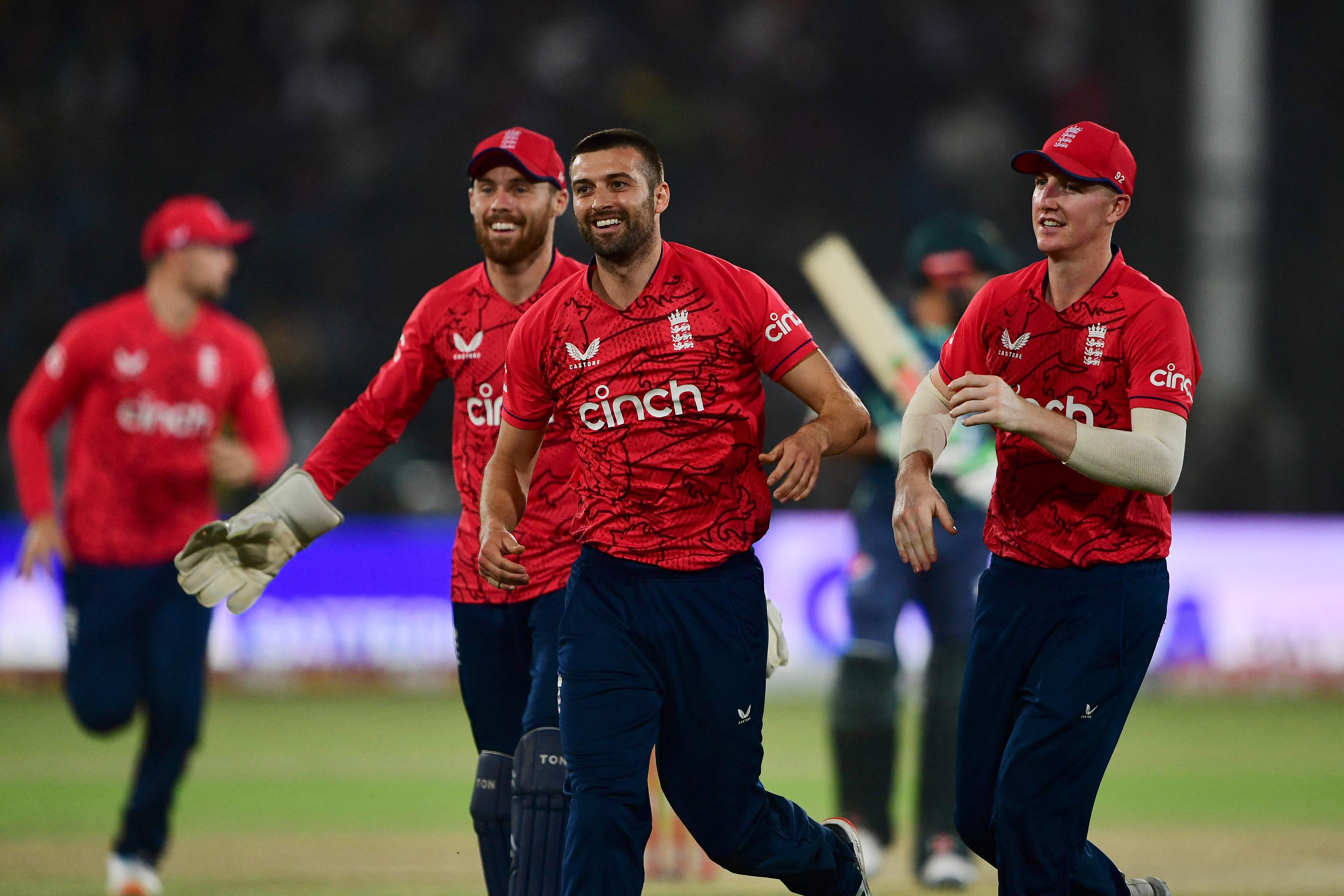 Mark Wood (centre) celebrates after taking the wicket of Pakistan’s captain Babar Azam
