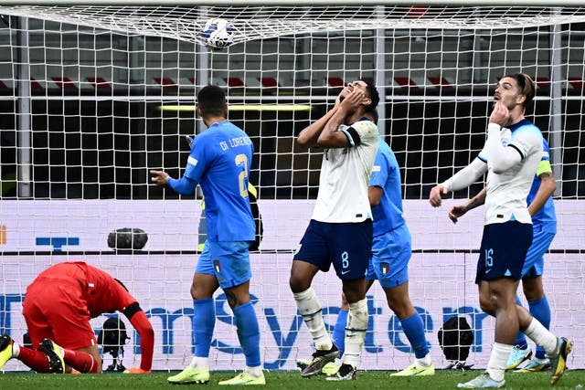 <p>England's midfielder Jude Bellingham (centre) reacts after missing a shot</p>