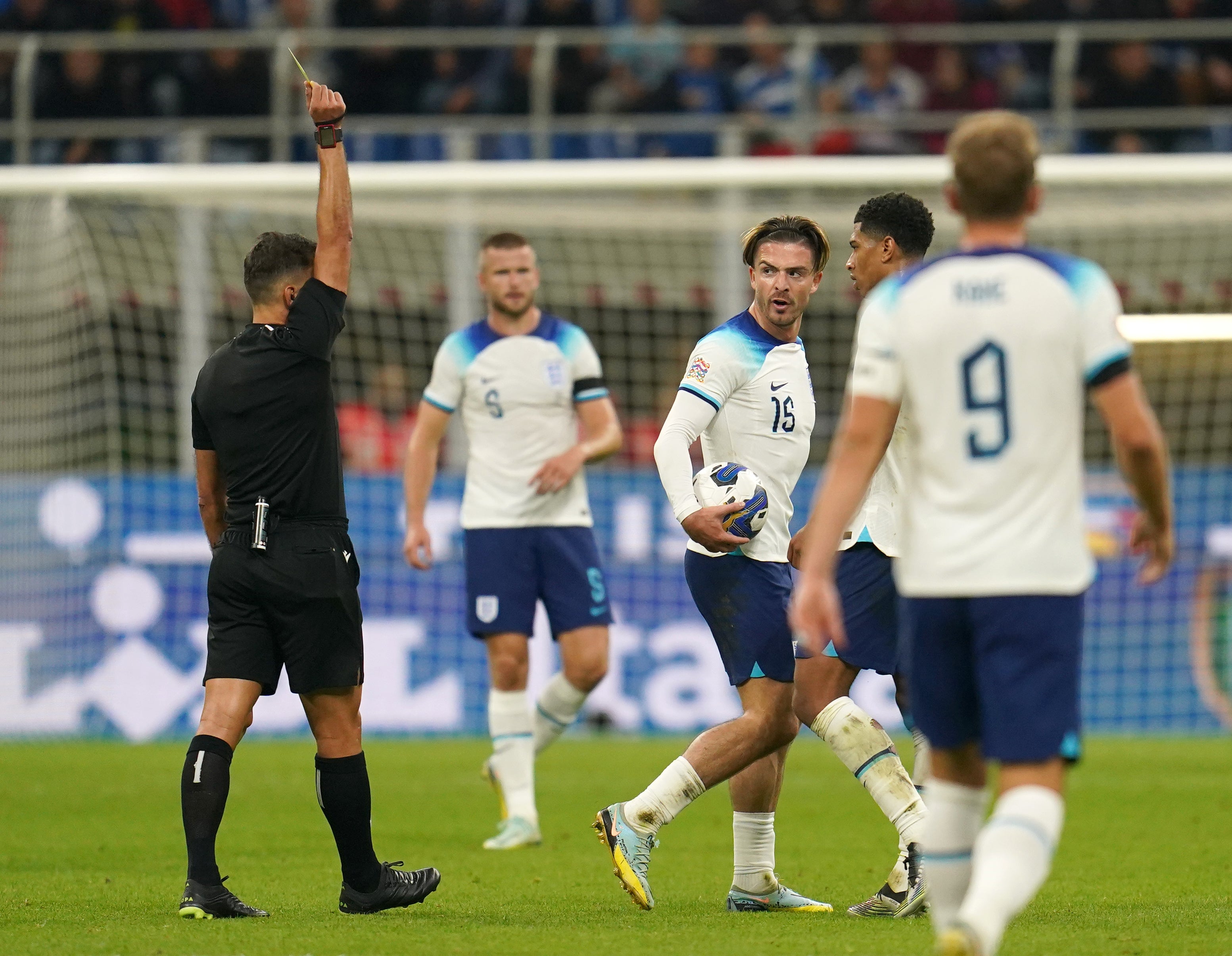 England’s Jack Grealish receives a yellow card from referee Jesus Gil Manzano (Nick Potts/PA)