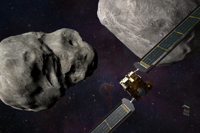 <p>An artist’s illustration of Nasa’s Double Asteroid Redirection Test (DART) mission as it closes in on the asteroid Dimorphos</p>