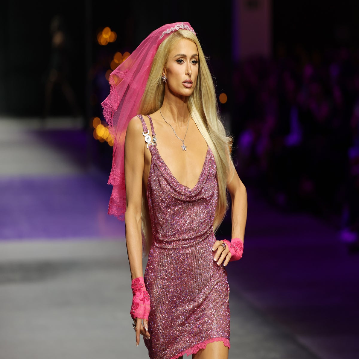 Paris Hilton Closes Versace Show at Milan Fashion Week in Pink Minidress