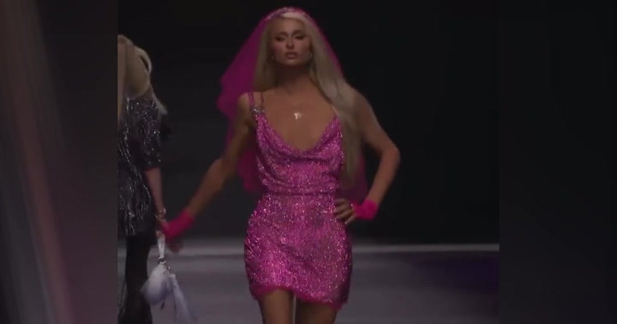 Versace's Milan fashion week show goes to high voltage extremes