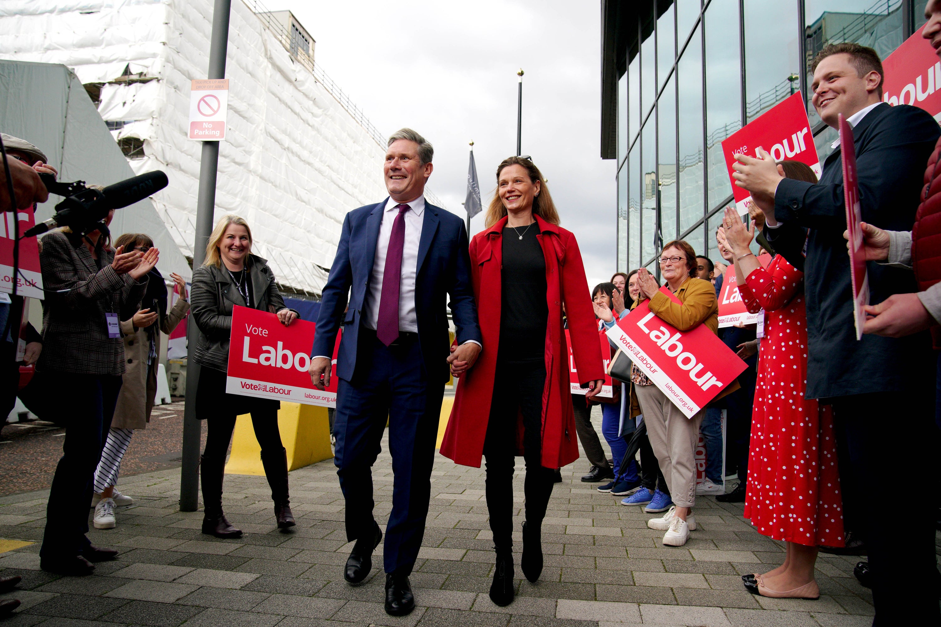 Sir Keir Starmer and his wife Victoria are greeted by Labour supporters as they arrive at the Pullman Hotel Liverpool ahead of the Labour Party conference (Peter Byrne/PA)