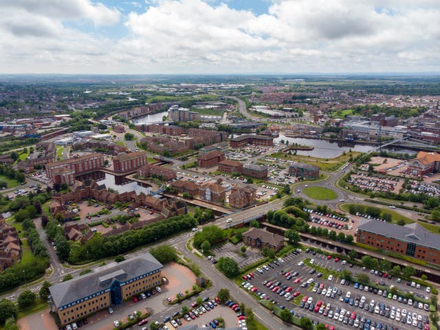 <p>Aerial photo of the UK town of Middlesbrough a large post-industrial town on the south bank of the River Tees in the county of North Yorkshire, taken on a bright sunny day</p>