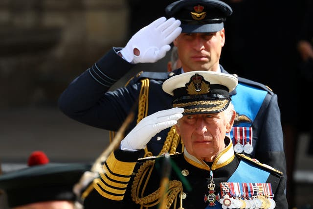 King Charles III and the Prince of Wales at the State Funeral of Queen Elizabeth II (Hannah McKay/PA)