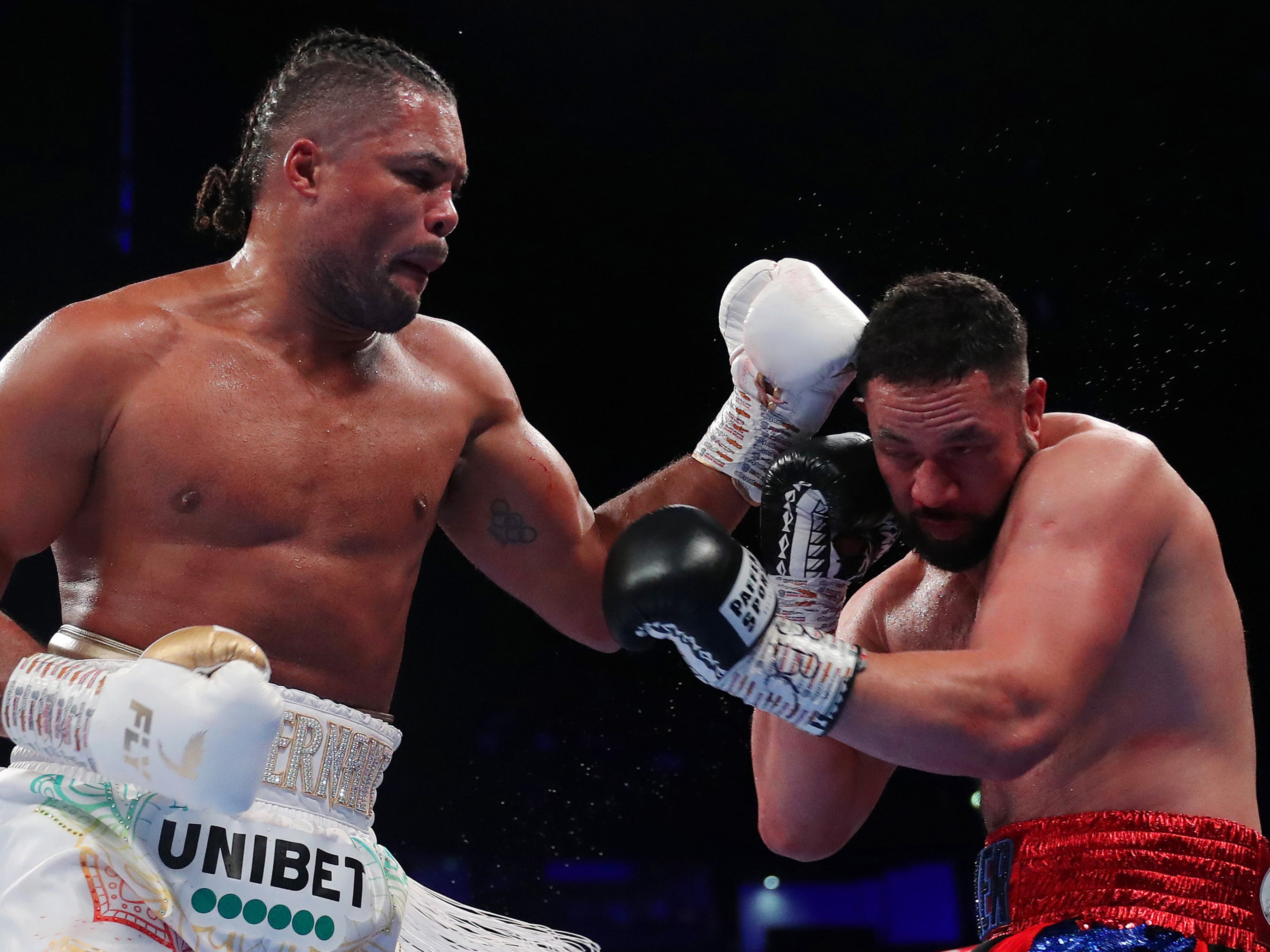 Joe Joyce (left) became the first fighter to earn a stoppage win against Joseph Parker