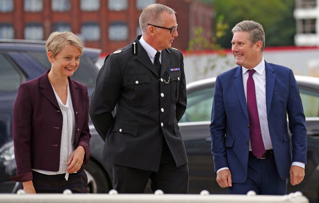 Labour leader Sir Keir Starmer and shadow home secretary Yvette Cooper with Assistant Chief Constable Paul White at Merseyside Police headquarters in Liverpool (Peter Byrne/PA)
