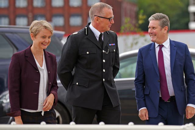 Labour leader Sir Keir Starmer and shadow home secretary Yvette Cooper with Assistant Chief Constable Paul White at Merseyside Police headquarters in Liverpool (Peter Byrne/PA)