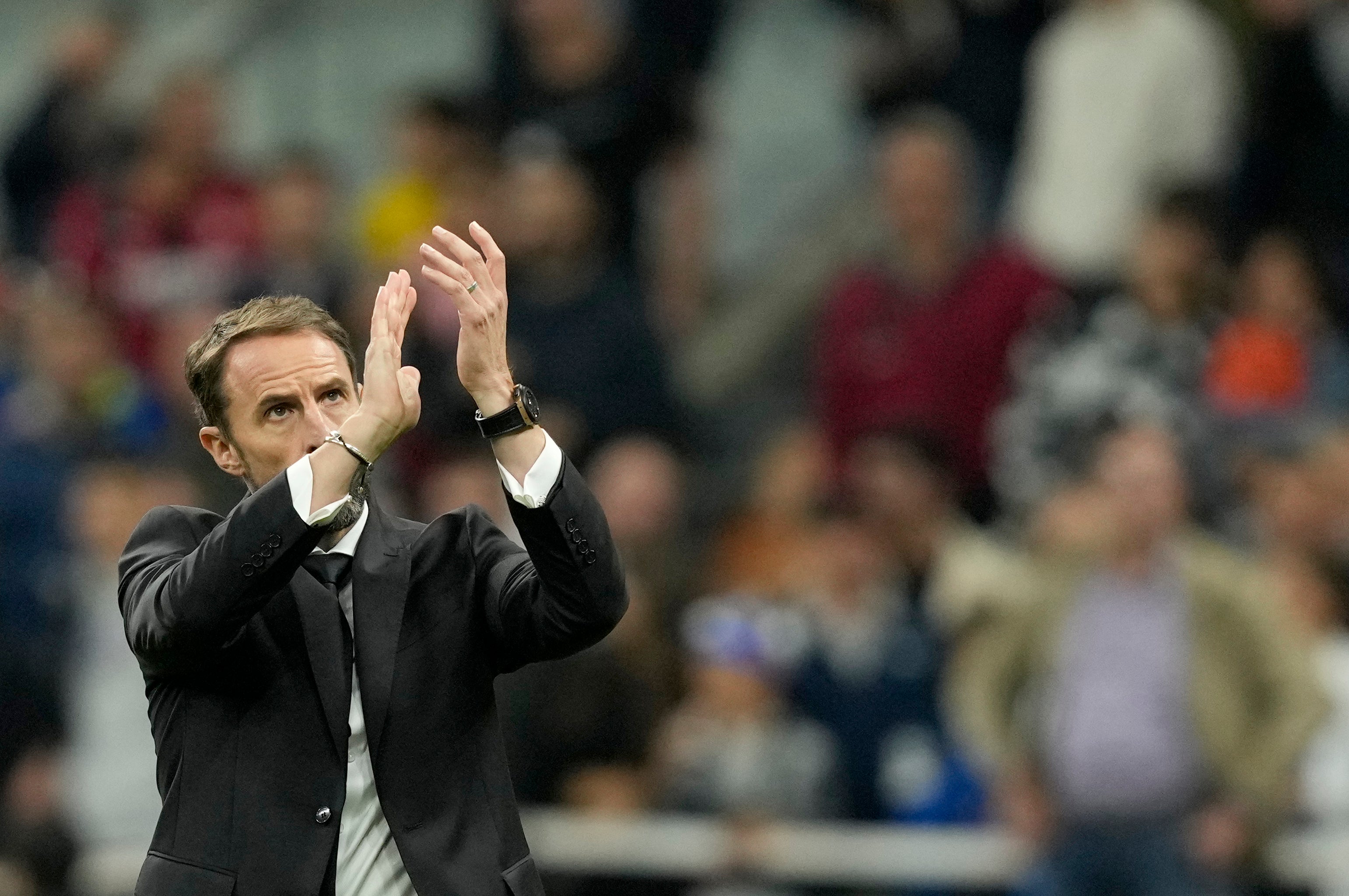 Southgate’s applause of the travelling fans in San Siro was greeted by booing (Antonio Calanni/AP)