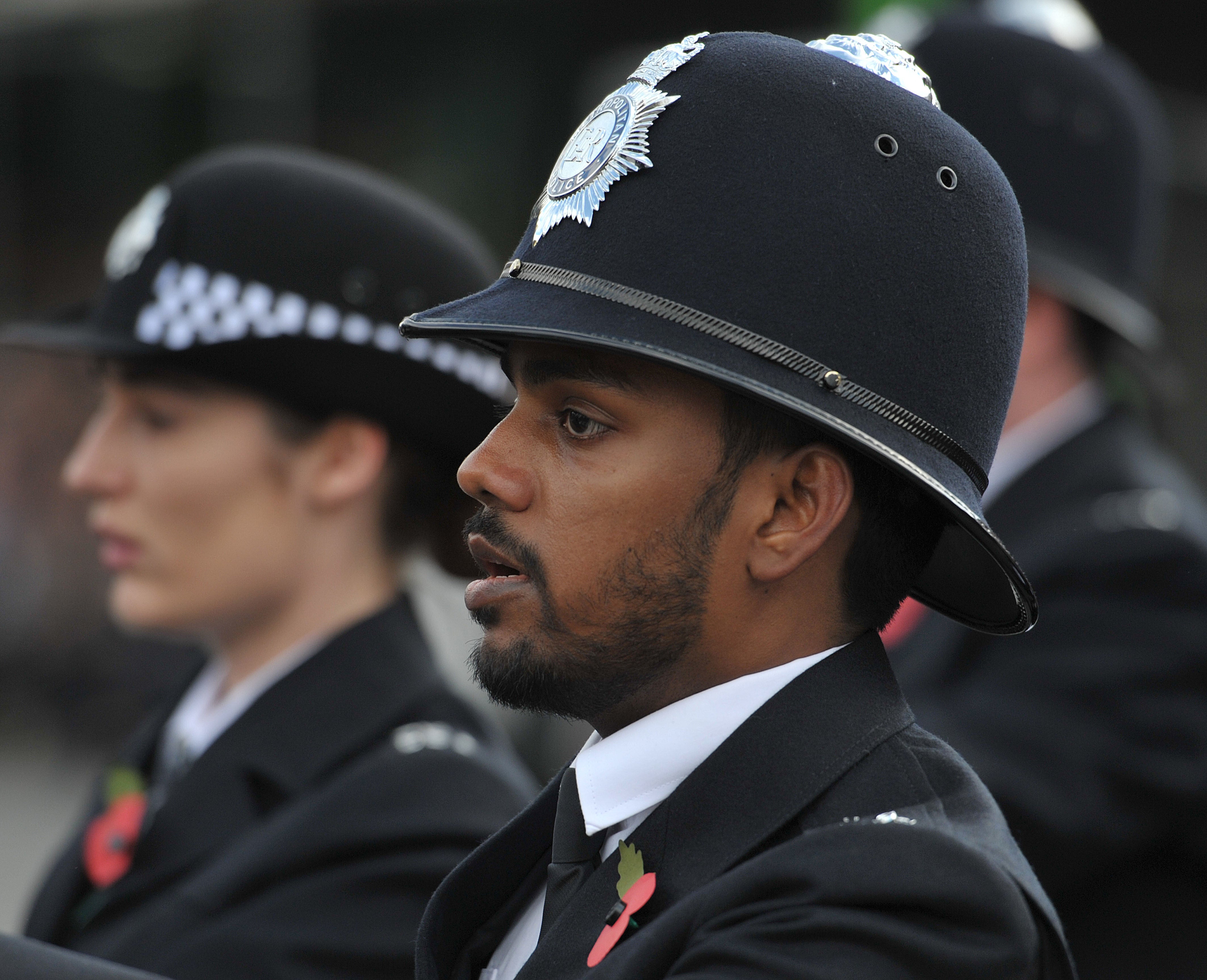 Metropolitan Police recruits during a passing out parade for new officers. Their fallen colleagues have been remembered at a ceremony in Northern Ireland (Nick Ansell/PA)