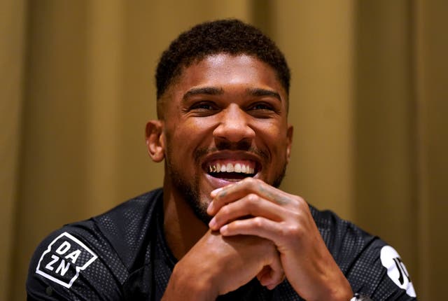 Anthony Joshua insists he will sign the contract to fight Tyson Fury (Nick Potts/PA)