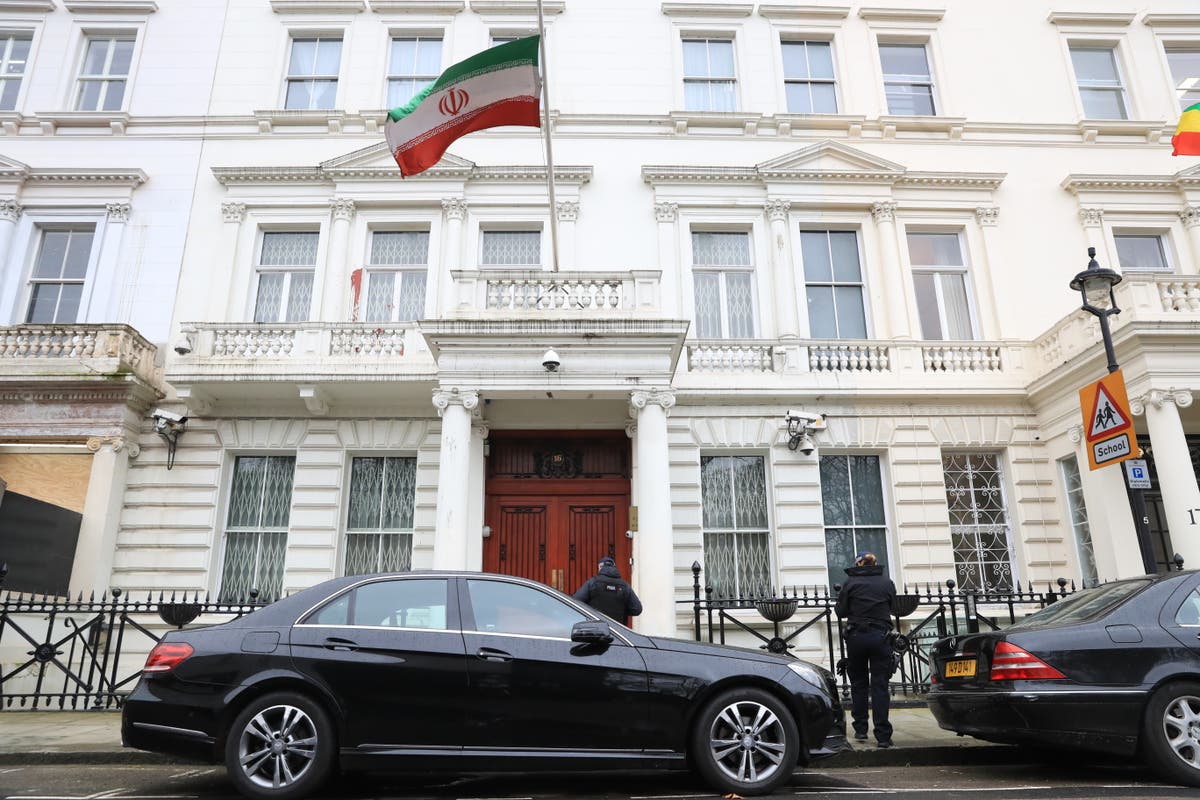 Protesters clash with police outside Iranian embassy in London
