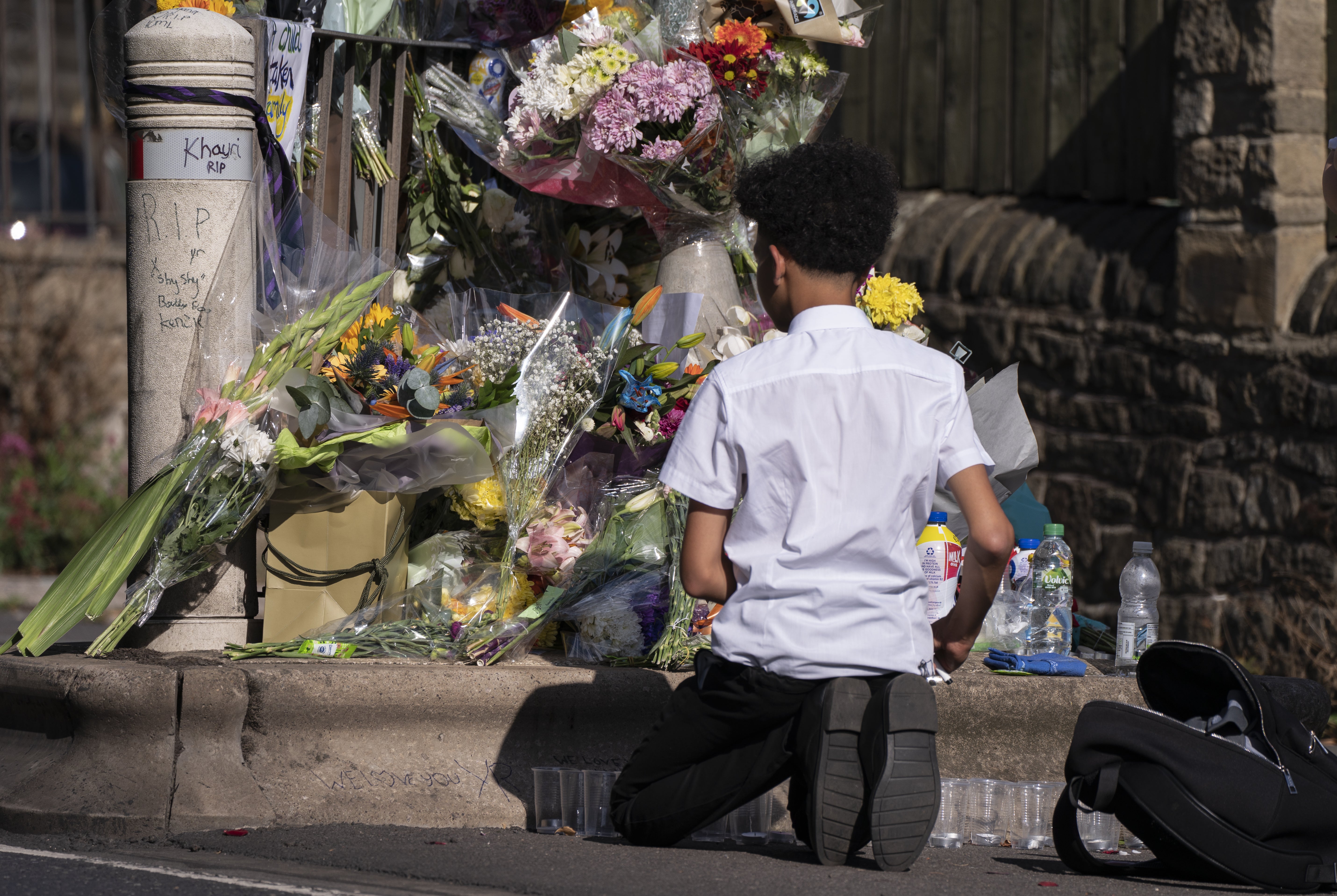 Two teenagers will face court charged with murder following the fatal stabbing of a boy just outside his school gates (Danny Lawson/PA)