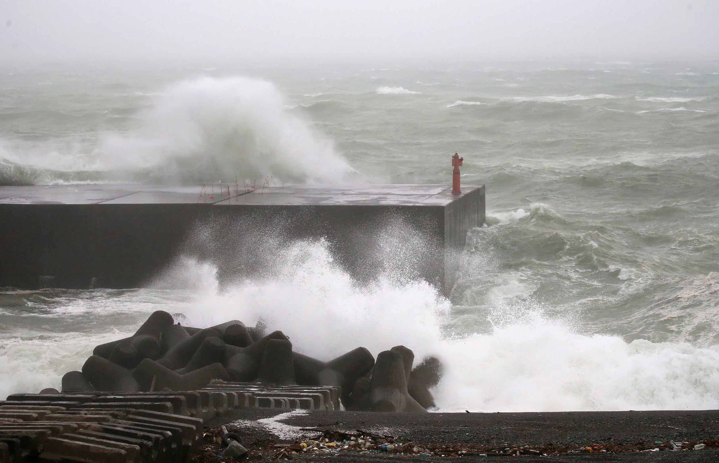 Large waves are seen at the port in Kumano city, Mie prefecture
