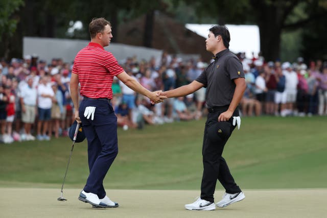 <p>Si-woo Kim (right) beat Justin Thomas 1 up on the final day of the Presidents Cup </p>