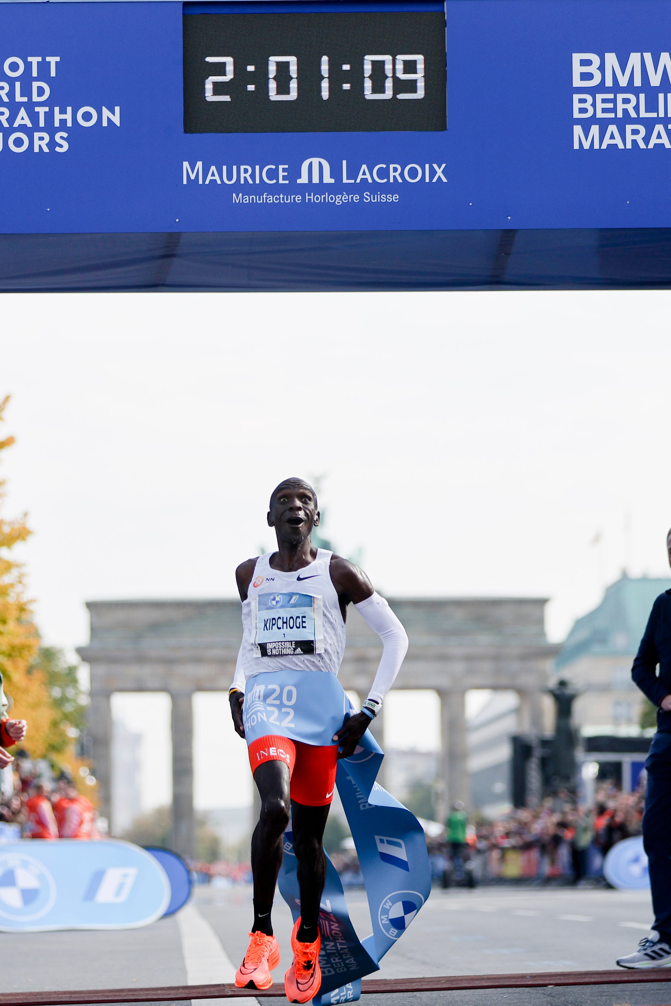 Smashing time: Kipchoge crosses the line to win in Berlin