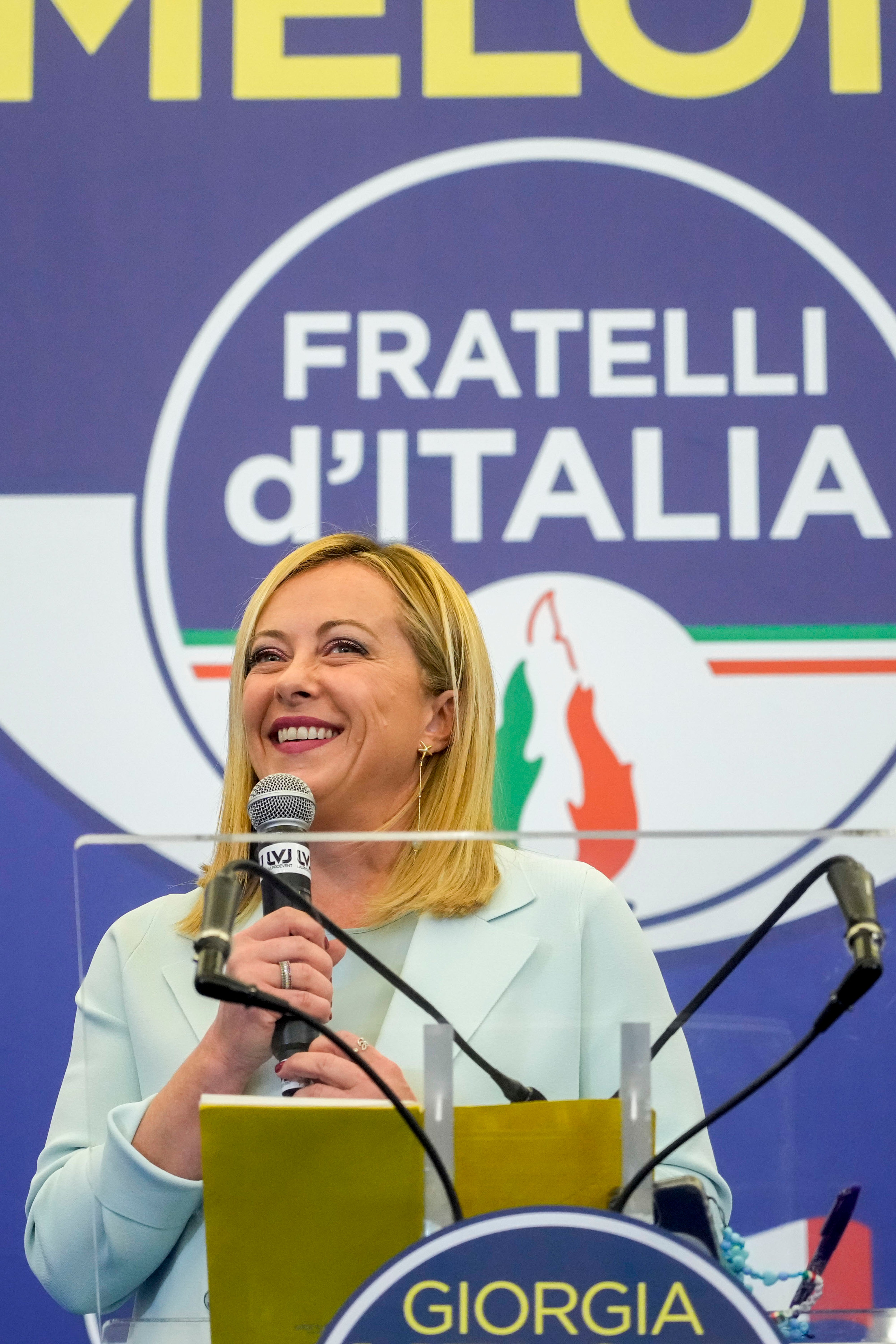 Meloni speaks to the media at her party’s electoral headquarters in Rome