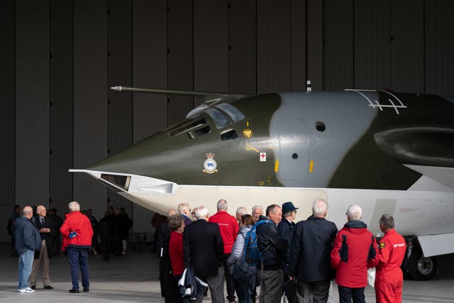 <p>Cold War veterans view the Handley Page Victor XH648 aircraft </p>