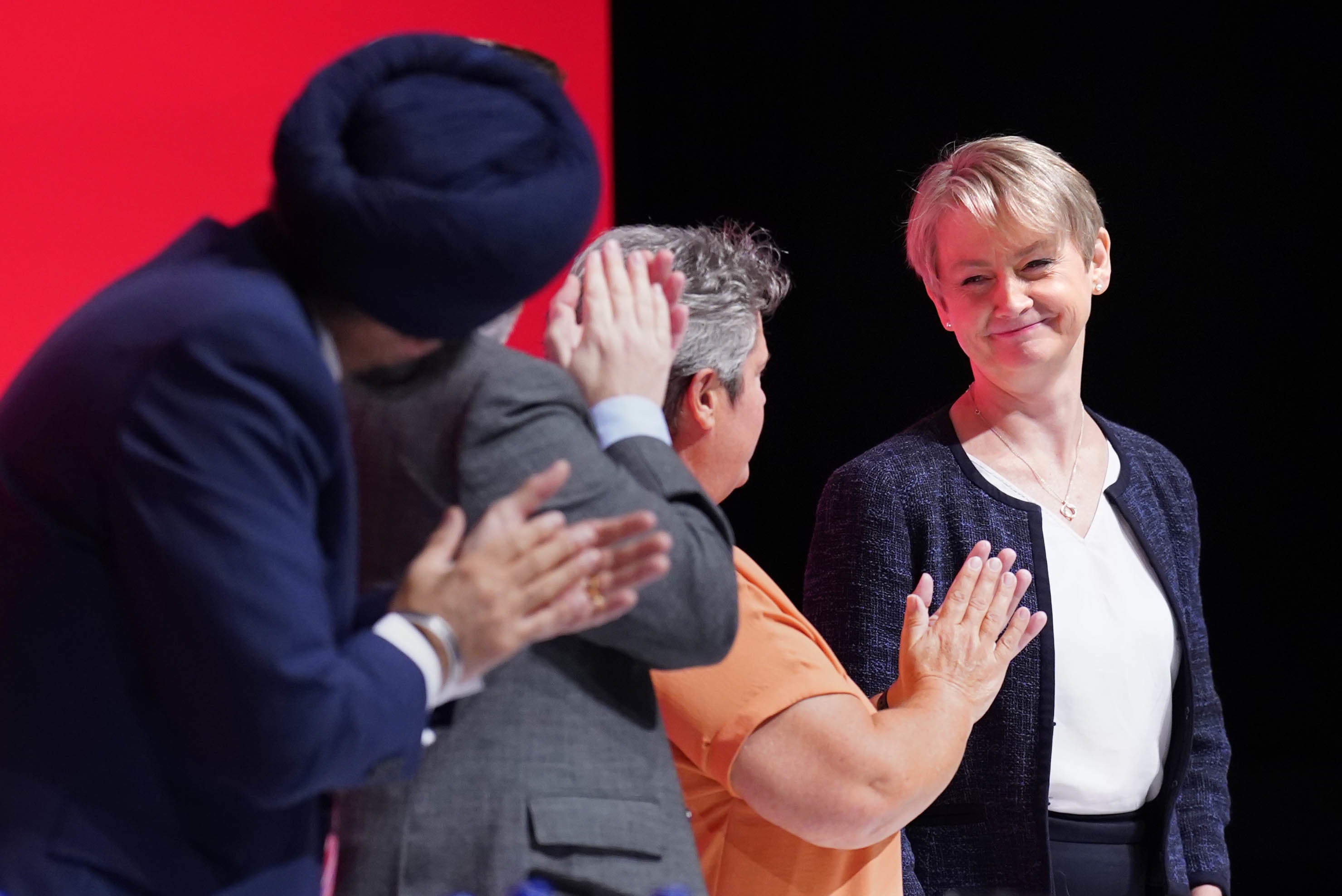 Shadow home secretary Yvette Cooper is applauded after her speech at the Labour Party conference (Stefan Rousseau/PA)