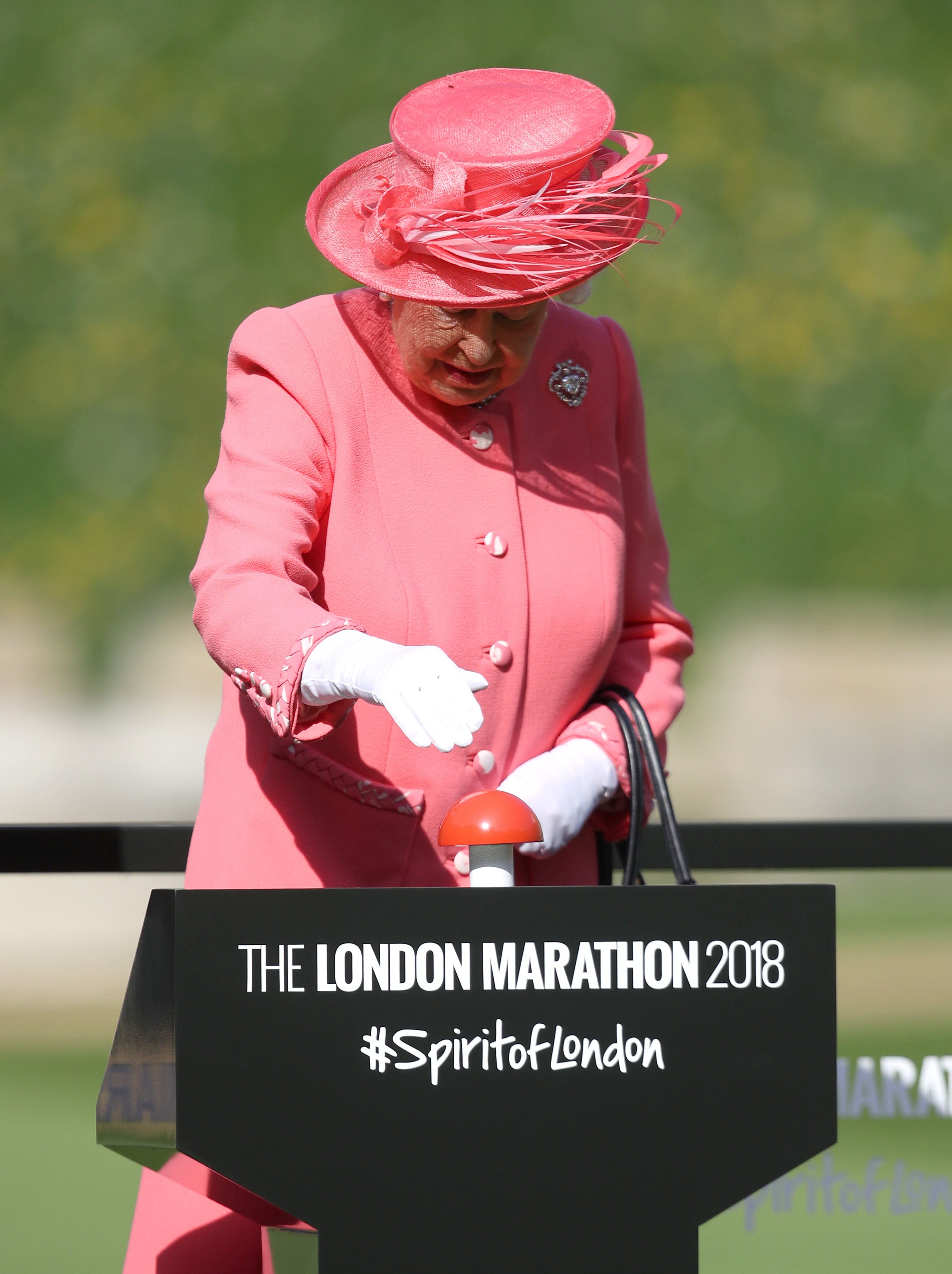 The Queen, at Windsor Castle, presses a button to start the 2018 London Marathon (Chris Jackson/PA).