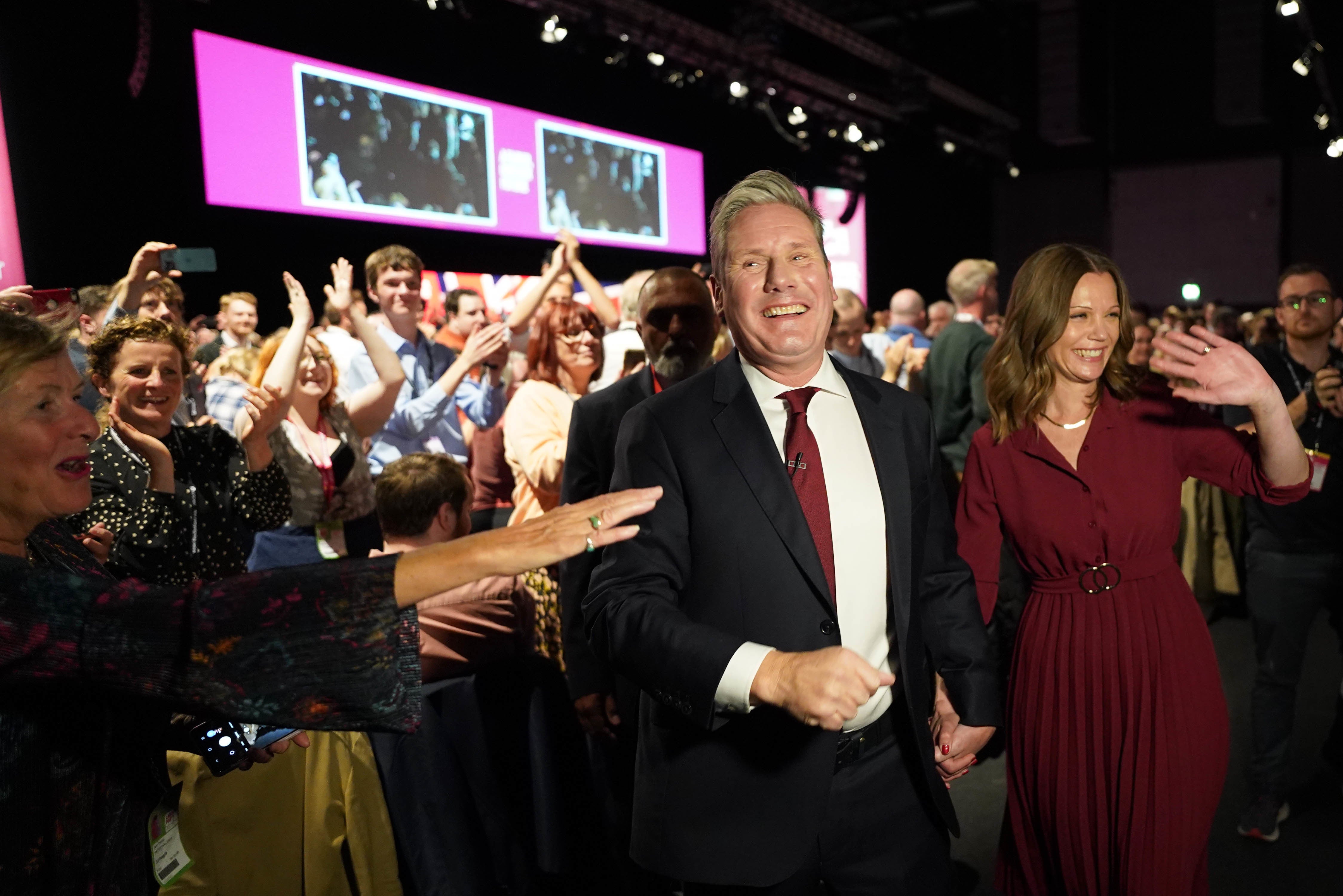 Labour Party leader Sir Keir Starmer, with his wife Victoria, leaves the stage after giving his keynote address during the party’s conference (Stefan Rousseau/PA)