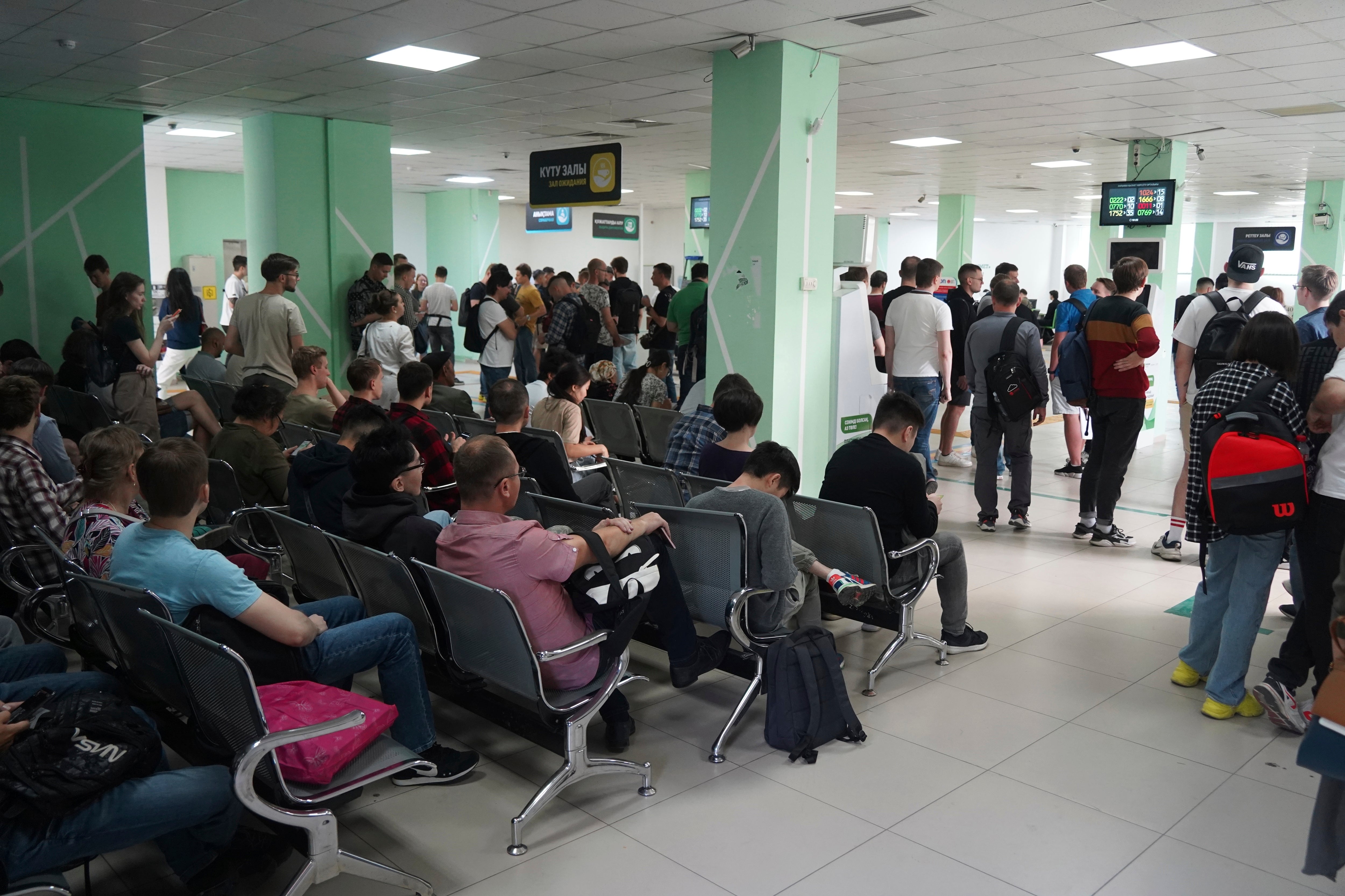 Russians wait to get personal identification numbers in Almaty, Kazakhstan on 27 September