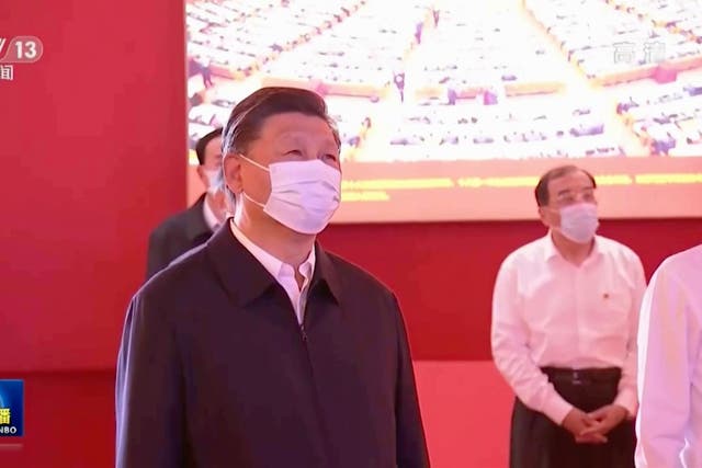 <p>In this image taken from video footage run by China's CCTV, Chinese President Xi Jinping and other Chinese leaders visit an exhibit with the theme of "Forging Ahead into the New Era" at the Beijing Exhibition Hall on Tuesday, 27 September 2022</p>