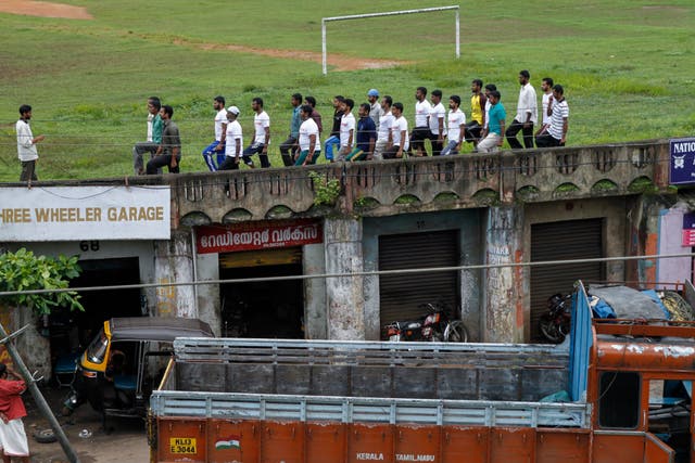 <p>Members of the Muslim organization Popular Front of India (PFI) undergo parade training at a football ground in Kottayam, southern Kerala state, India, 27 June 2010</p>