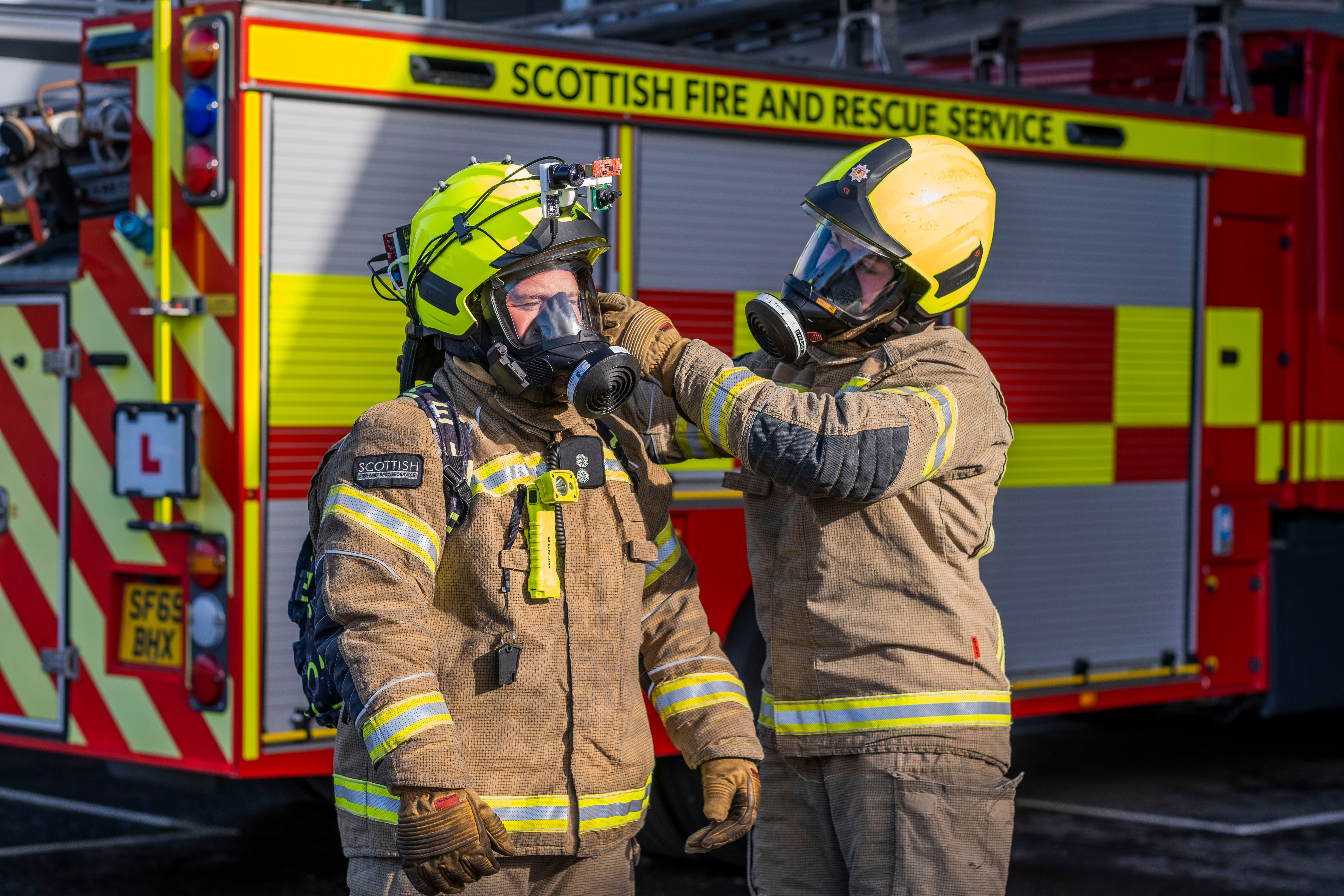 Firefighters try out the new enhanced helmets at Newbridge, Edinburgh. (Craig Watt/PA)